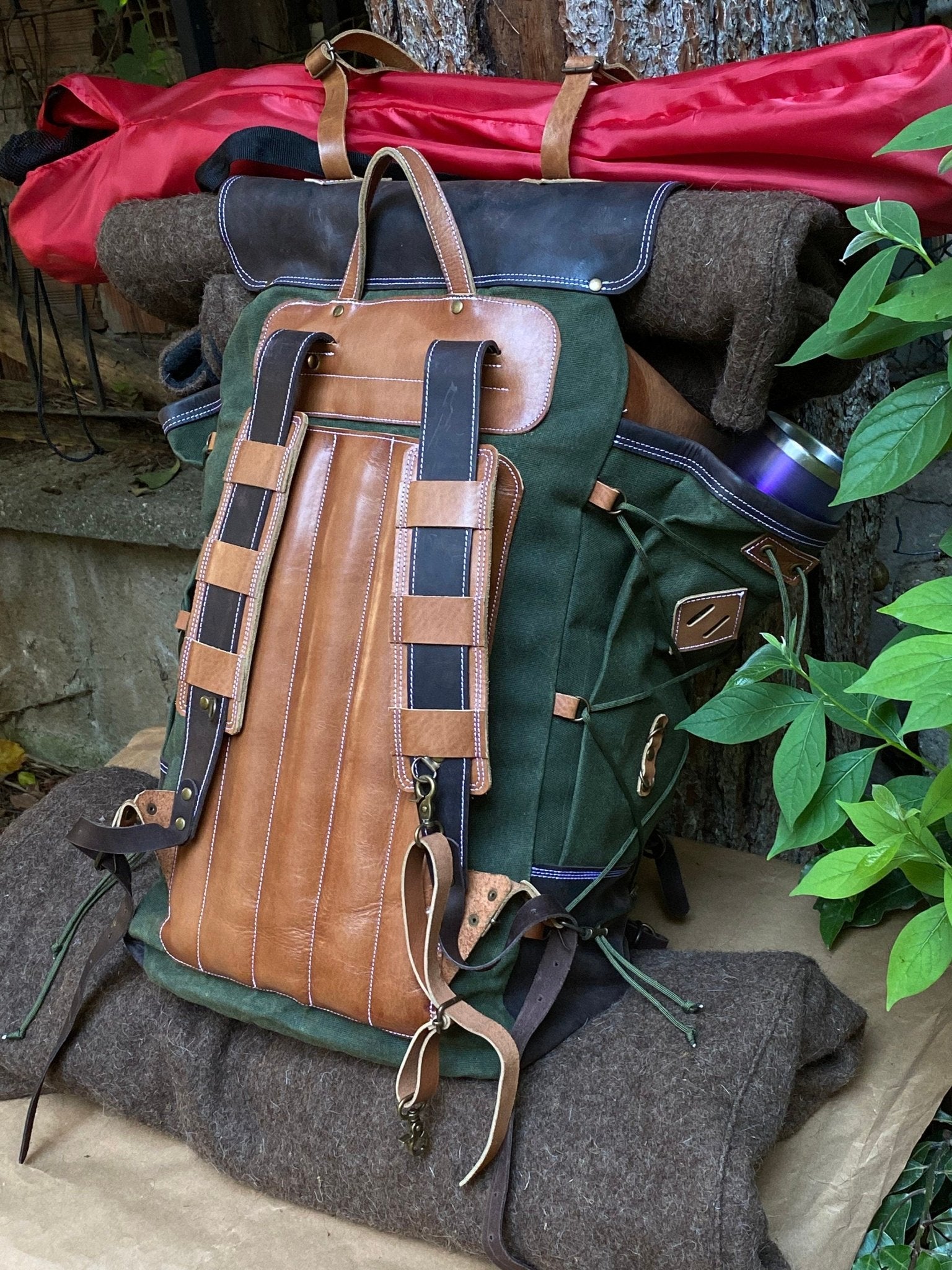 http://www.99percenthandmade.com/cdn/shop/products/unique-handmade-canvas-backpack-50-l-personalization-leather-backpack-bushcraft-bag-travel-camping-hunting-fishing-sports-bag-bushcraft-camping-hiking-backpack-760602.jpg?v=1678665563