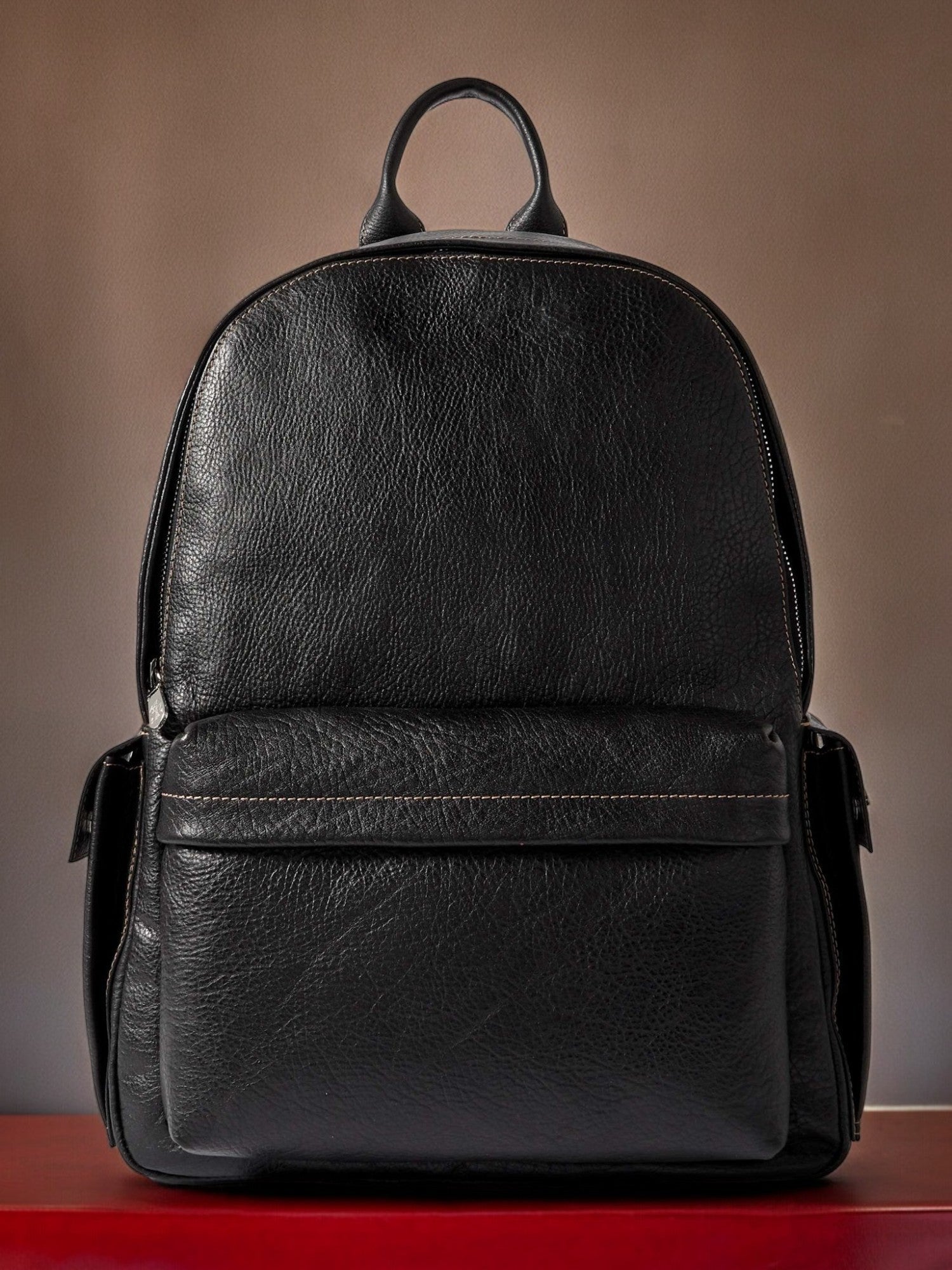 100% handmade Black backpack made popular entirely of high quality genuine leather.